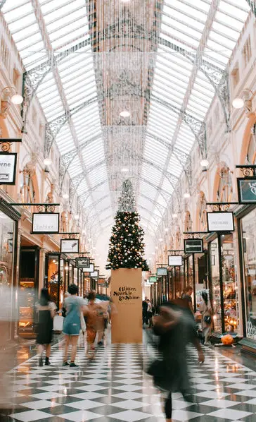 Warehouse with tall shelves representing retail inventory management.